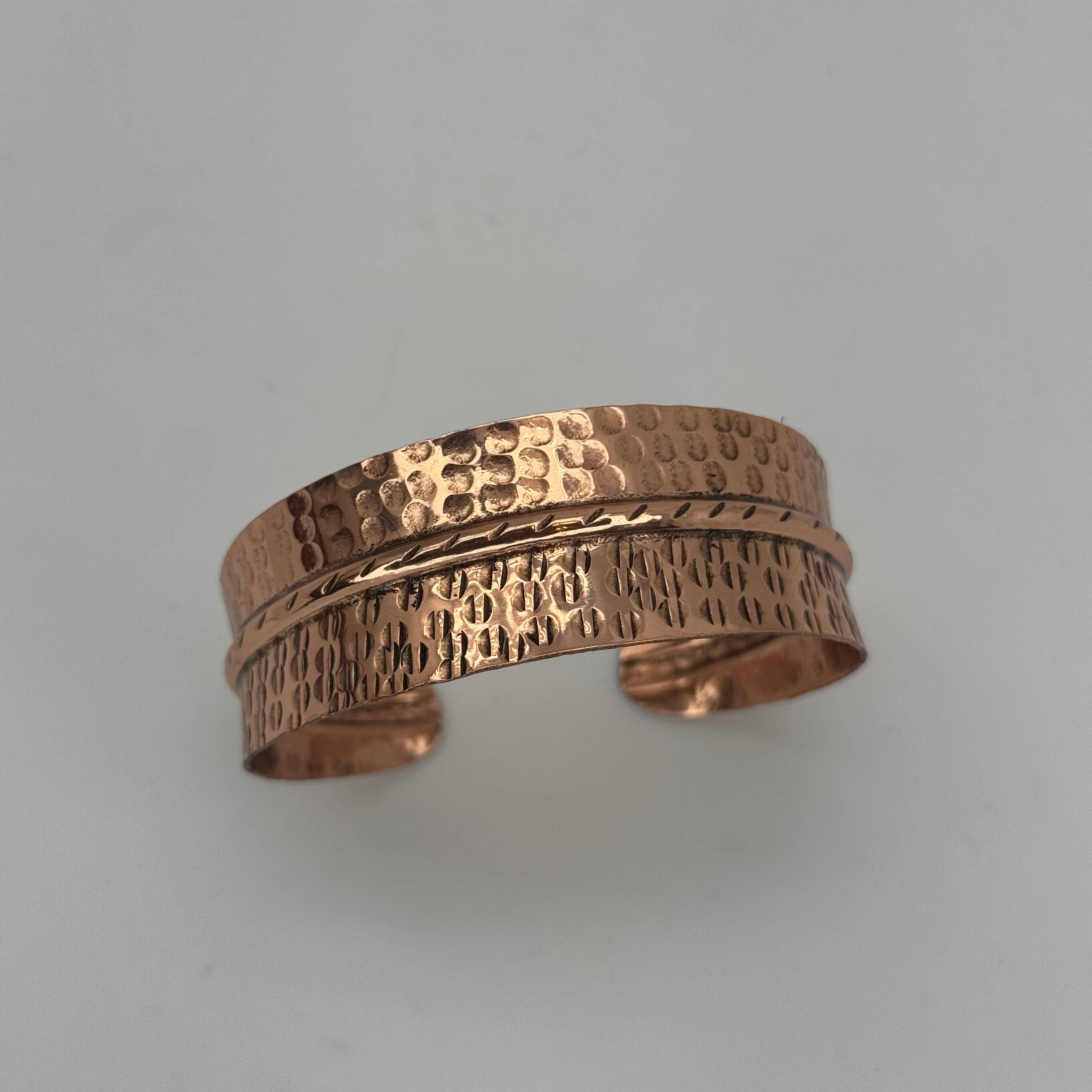 Handcrafted dual texture hammered and Crosshatch Copper cuff