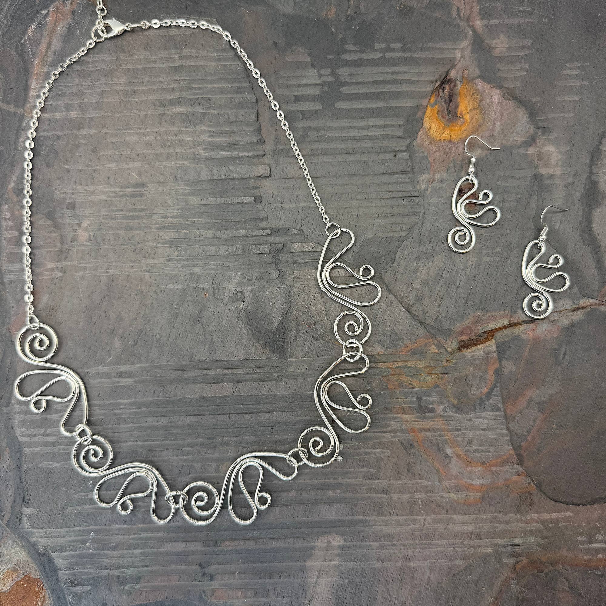 Handcrafted Whimsical Swirl Silver Necklace